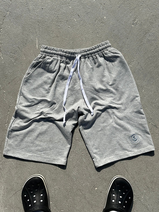 Gray shorts on a concrete surface